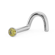 Side profile of 14k white gold yellow diamond bezel nose stud showing twist post shape and flush fit