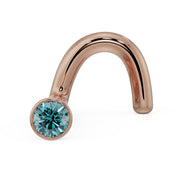 14k rose gold blue diamond bezel nose ring twist style, angled view showing warm tone contrast