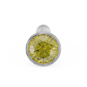Front-facing view of white gold yellow diamond bezel nose stud showing bone post top