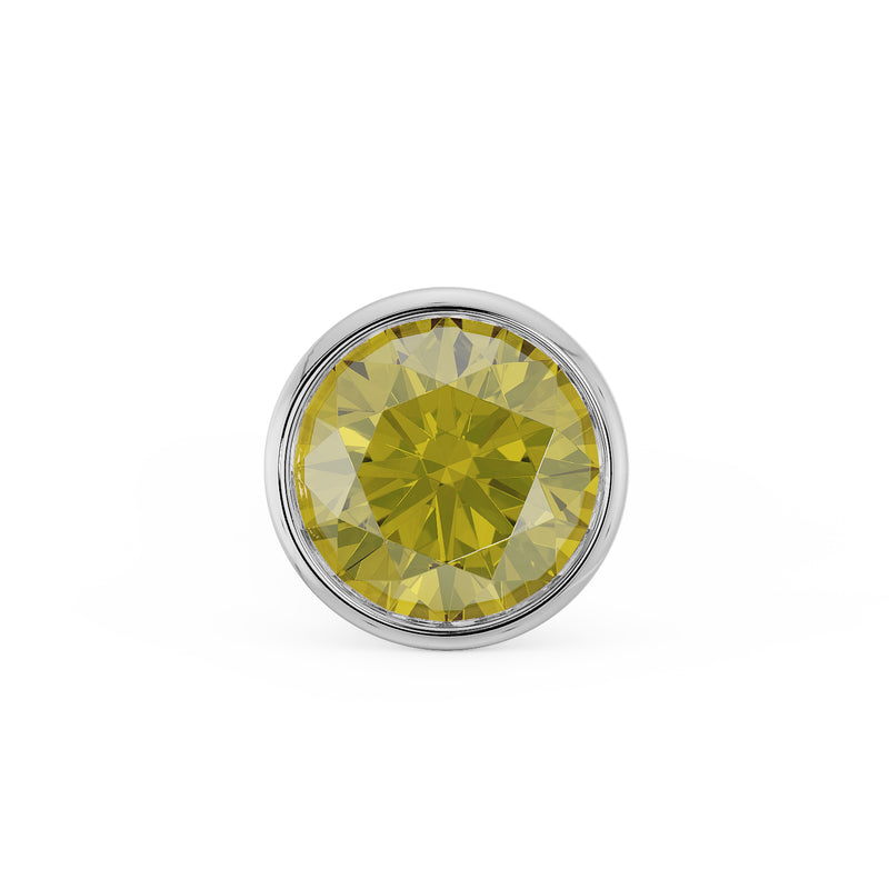 Close-up of 2mm yellow diamond in white gold bezel setting, straight-on face view