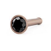 14k rose gold black diamond bezel nose bone stud, angled view showing ball-end post