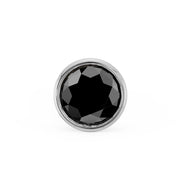 Close-up of 2mm genuine black diamond in white gold bezel setting, front-facing detail view