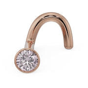 14k rose gold pink diamond bezel nose ring twist screw style, warm-toned angled view