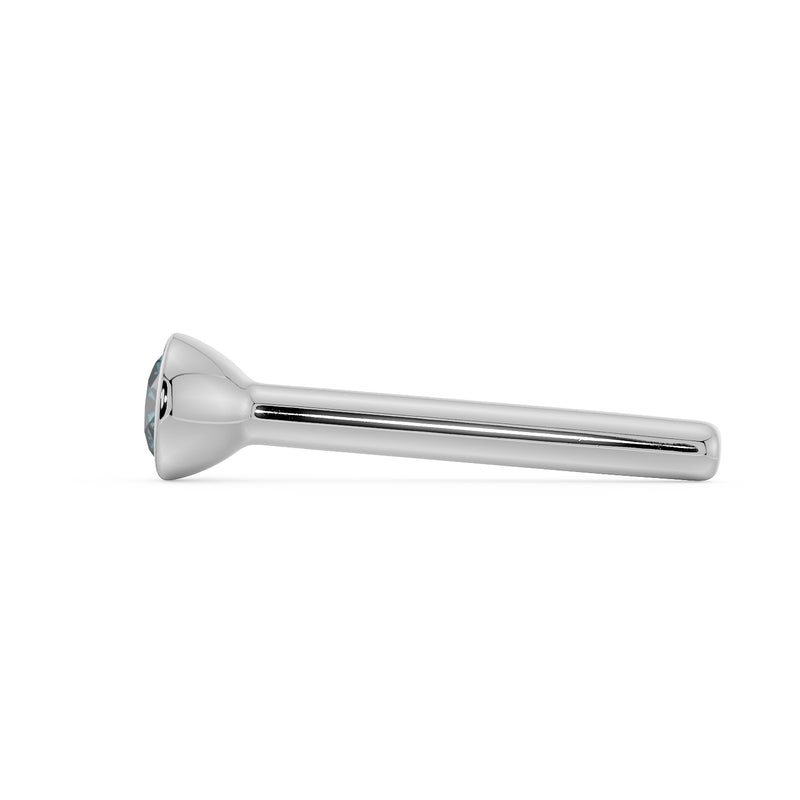 Profile view of white gold straight post blue diamond nose stud showing low-profile bezel and post tip