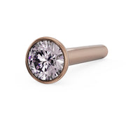 14k rose gold pink diamond bezel nose stud straight post, angled view showing rose gold contrast