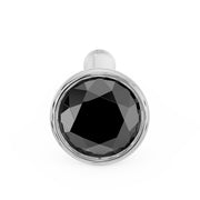 Front-facing close-up of 2.5mm black diamond bezel nose bone stud in white gold