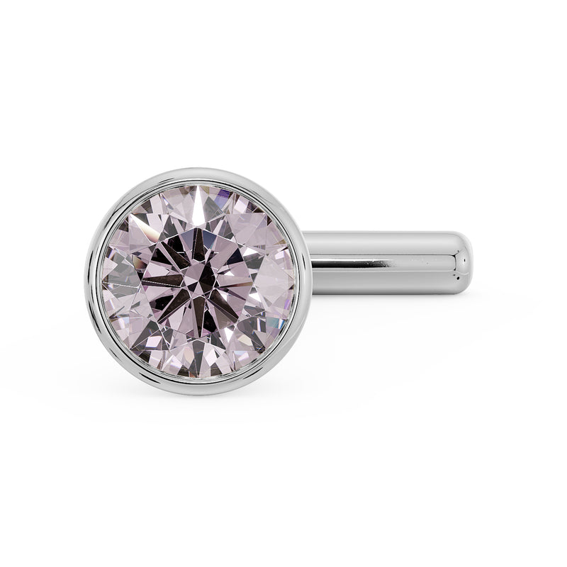 White gold pink diamond bezel nose stud with straight post, slightly elevated front angle view