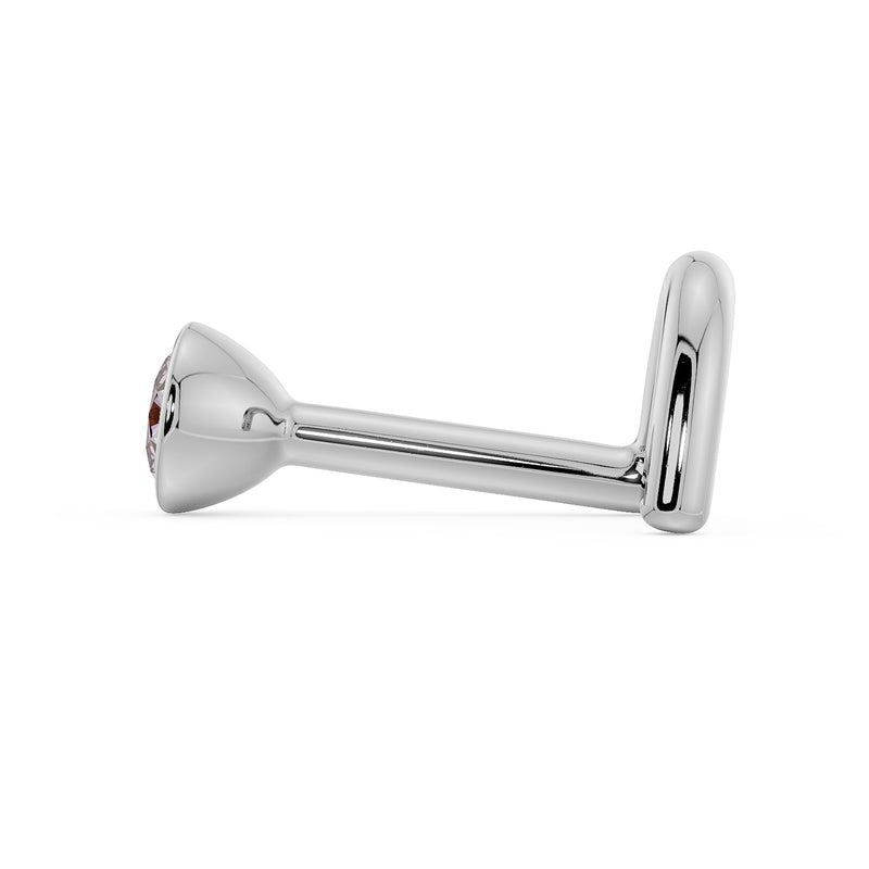 Side profile of white gold pink diamond bezel nose stud showing L-post shape and post length