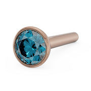 14k rose gold 2.5mm blue diamond bezel nose stud angled view showing straight post