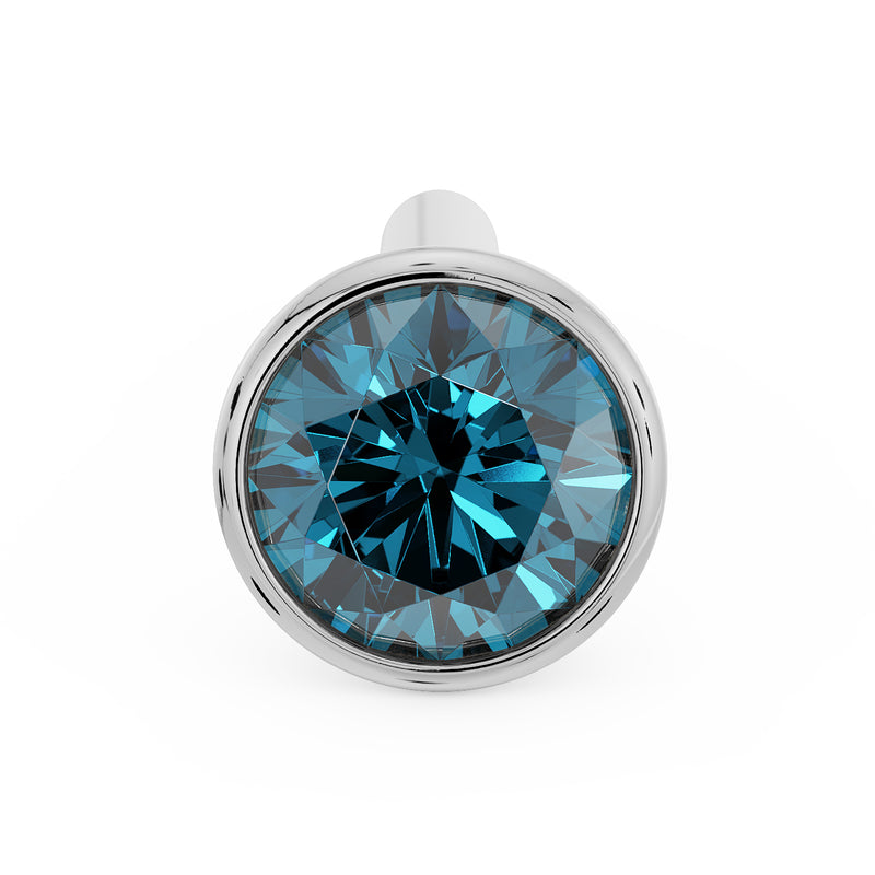Top-down close-up of white gold bone nose stud with 2.5mm blue diamond bezel setting