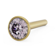 14k yellow gold pink diamond bezel nose stud with straight post, elevated front angle close-up