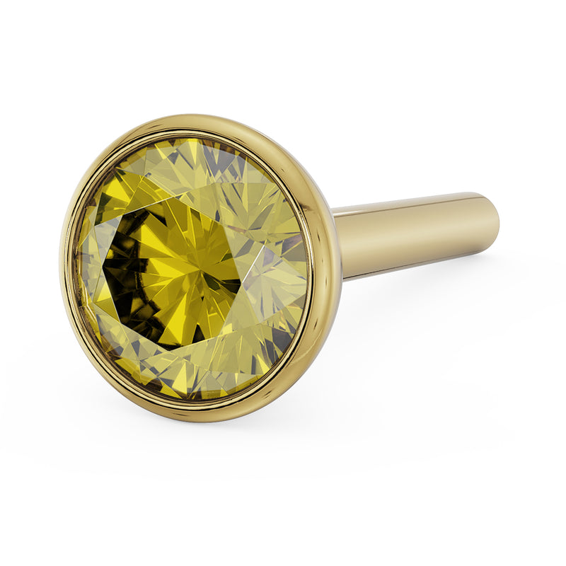 Close-up top view of 3mm yellow diamond in 14k yellow gold bezel nose stud, straight post