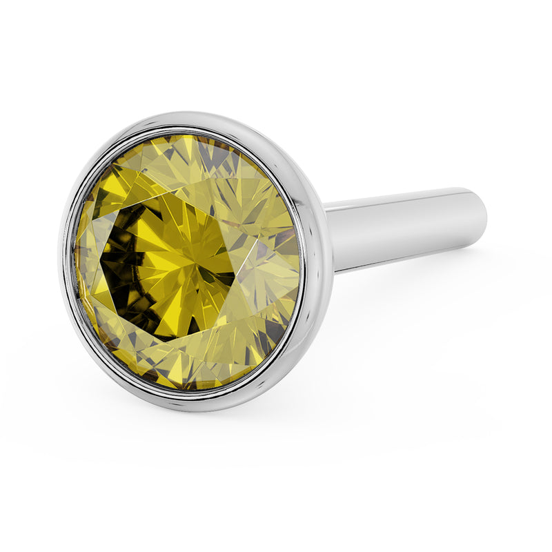 Angled top view of 3mm yellow diamond in white gold round bezel nose stud, straight post