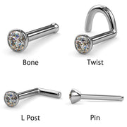 Side-by-side comparison of all four nose stud backing styles: bone, twist, L-post, and pin