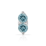 14K white gold nose ring with two round aquamarine gemstones in a vertical double-prong setting