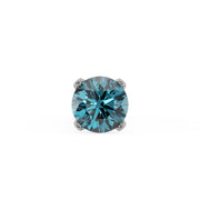 Close-up of 1.5mm round blue diamond in four-prong setting, white gold nose stud top view