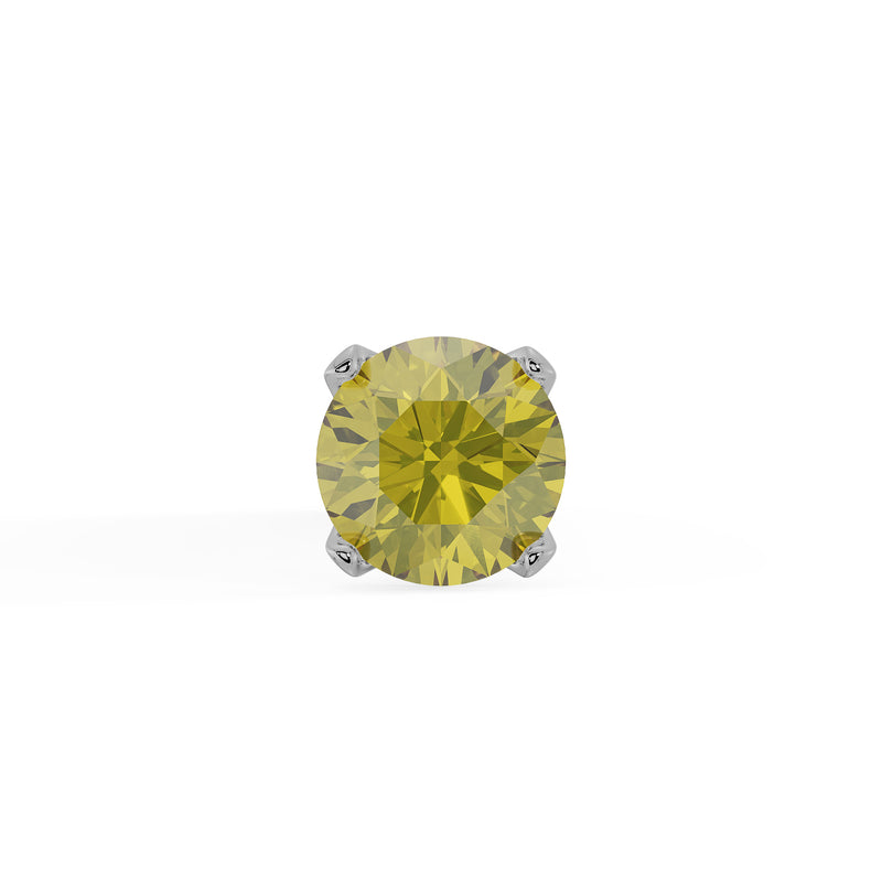 Close-up top-down view of 1.5mm yellow diamond in four-prong white gold setting