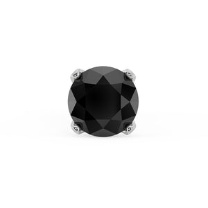 Close-up of 2mm round black diamond in four-prong setting on white gold nose stud