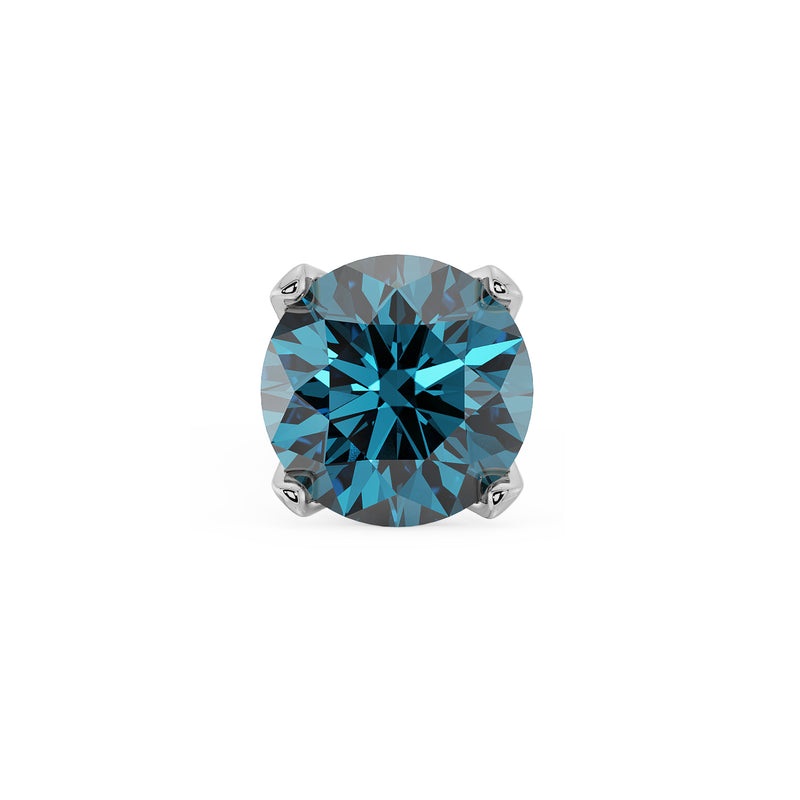 Close-up of 2mm genuine blue diamond in four-prong white gold setting showing facet sparkle