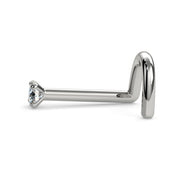 Side profile of 14k white gold diamond nose bone stud showing low-profile prong setting and post