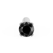 Top-down view of 1.5mm black diamond in four-prong setting on straight-post white gold nose stud