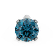 Top-down macro view of 2.5mm blue diamond in white gold 4-prong nose stud showing bone post tip