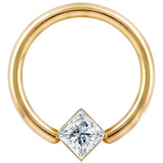 14K yellow gold fixed bead ring with princess cut diamond set at corner angle, front view