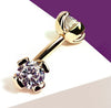 Close-up of 14k yellow gold diamond curved barbell highlighting prong setting and brilliant-cut stone