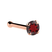 14K rose gold garnet nose bone with 1.5mm tiny red garnet in four-prong setting, side profile