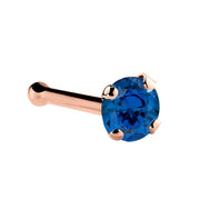 14K rose gold genuine sapphire nose bone with 2mm standard round stone in prong setting, side view