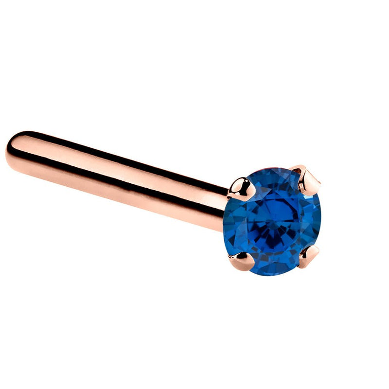 14K rose gold blue sapphire straight pin post nose ring with 1.5mm tiny stone, angled view
