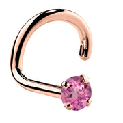 14K rose gold pink tourmaline twist nose ring, 1.5mm tiny stone in prong setting, angled view