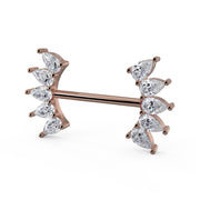 Angled side view of 14k rose gold white sapphire crescent nipple barbell showing depth of setting