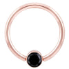 14K rose gold fixed bead ring with bezel-set round black diamond, front view