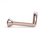 Side profile of 14k rose gold diamond bezel nose stud, L post style showing bent angle