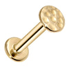 14k yellow gold hammered disc flat back labret showing barbell post and flat backing, angled view