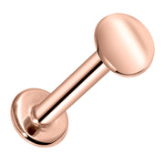 14K rose gold 4mm disc flat back labret stud, front-angled view on white background