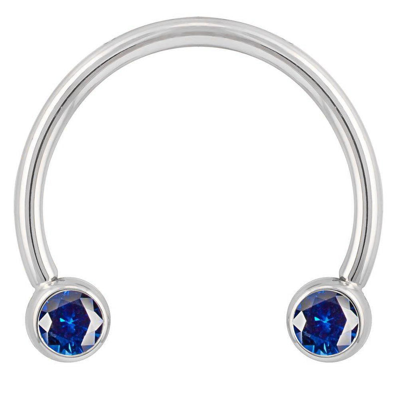 14k white gold blue cubic zirconia circular barbell, smaller diameter showing polished silver-tone horseshoe shape