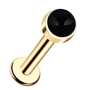 14k yellow gold flat back labret with 3mm bezel-set black onyx cabochon, angled product view
