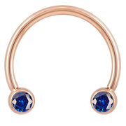 14k rose gold blue CZ circular barbell, smaller diameter front view highlighting bezel setting contrast