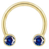 14k yellow gold circular barbell with dual blue CZ round bezel ends, front view on white background
