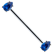 14k white gold industrial barbell with dual blue pear-cut CZ gems in prong settings, diagonal view