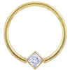 14k yellow gold fixed bead ring with princess-cut CZ in corner mount setting, front view