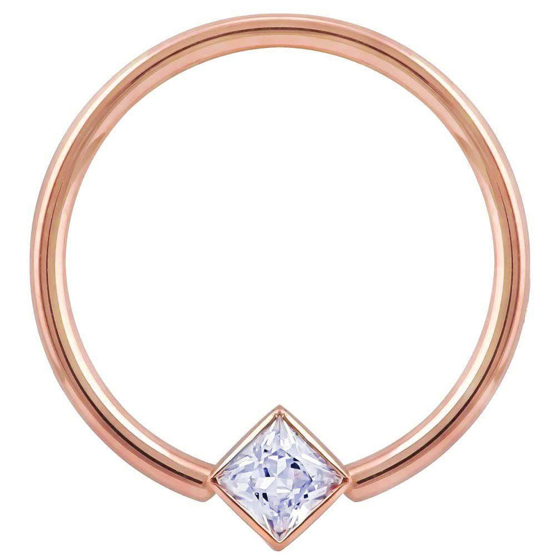 14k rose gold fixed bead ring with princess-cut CZ in corner mount setting, front view