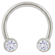 14k white gold circular barbell with dual round CZ bezel ends, front view on white background
