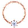 14k rose gold CZ fixed bead ring, larger hoop diameter showing warm rose tone and prong-set CZ