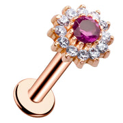 14k rose gold gem cluster flat back labret with synthetic ruby and CZ halo, angled view