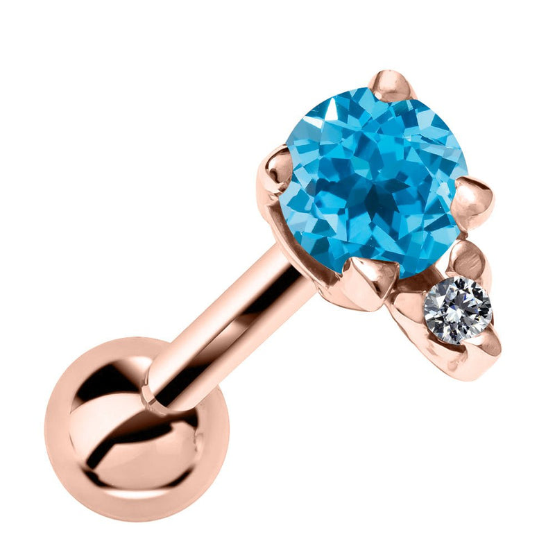 14k rose gold cartilage stud with genuine blue topaz and diamond accent, front view