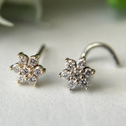 14K yellow and white gold diamond flower nose rings side by side showing color comparison, close-up
