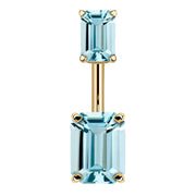 14k yellow gold belly ring with double emerald-cut light blue CZ stones in four-prong settings, front view